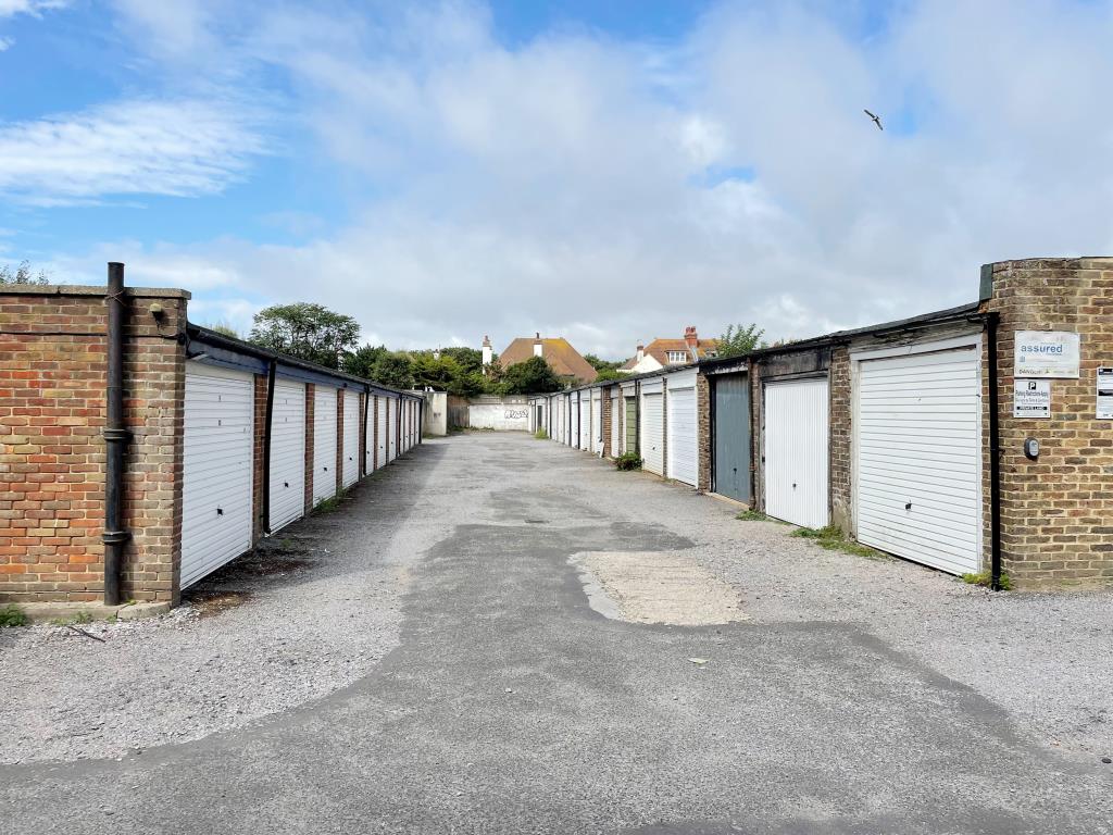 Lot: 36 - FREEHOLD LOCK-UP GARAGE JUST OFF HOVE SEAFRONT - westerly view of compound with dual access